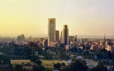Nairobi city skyline under a pale sky, Kenya's hub for African fintech companies