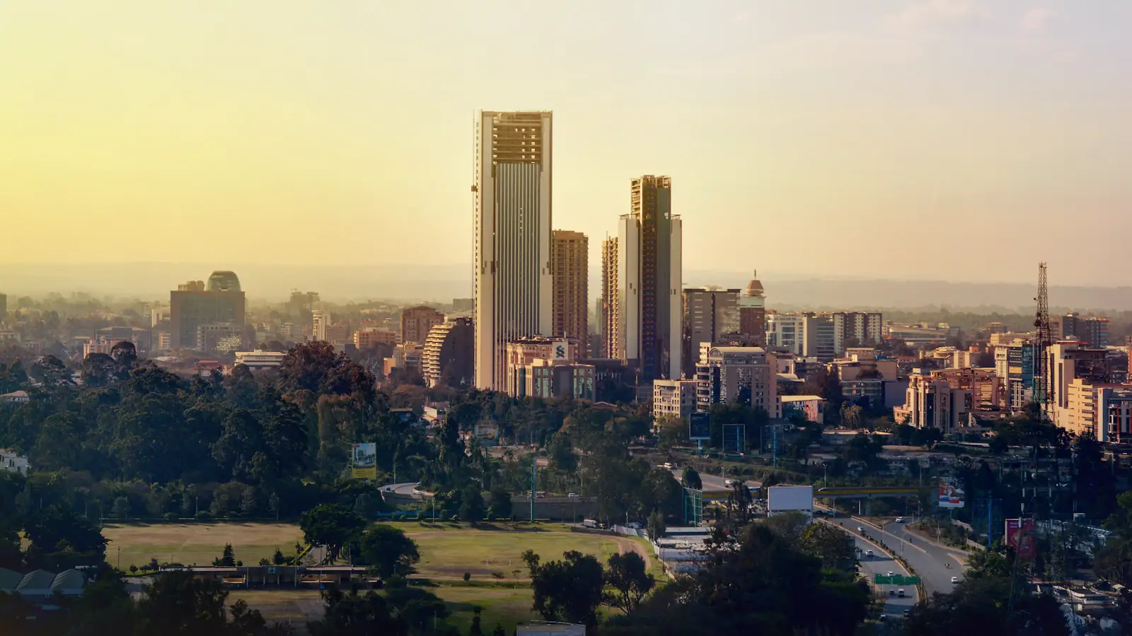 Nairobi city skyline under a pale sky, Kenya's hub for African fintech companies