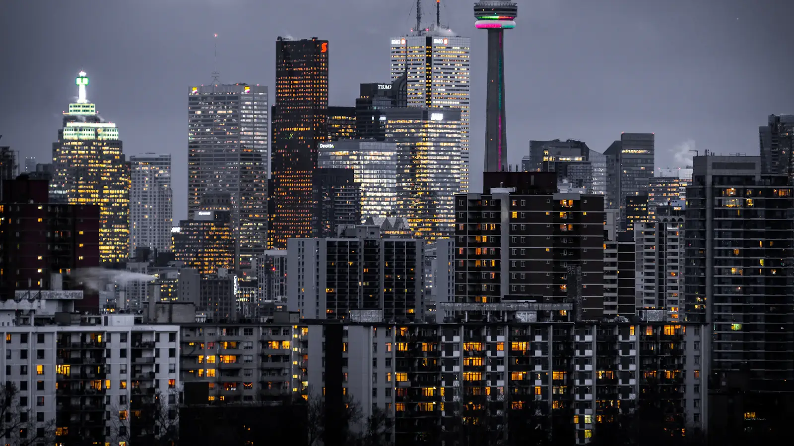 CN Tower and illuminated Toronto skyline at dusk, home of Canada's leading fintech companies