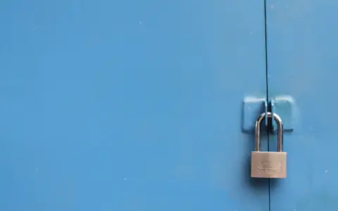 Close-up of a silver padlock, a symbol of the privacy questions around central bank digital currencies