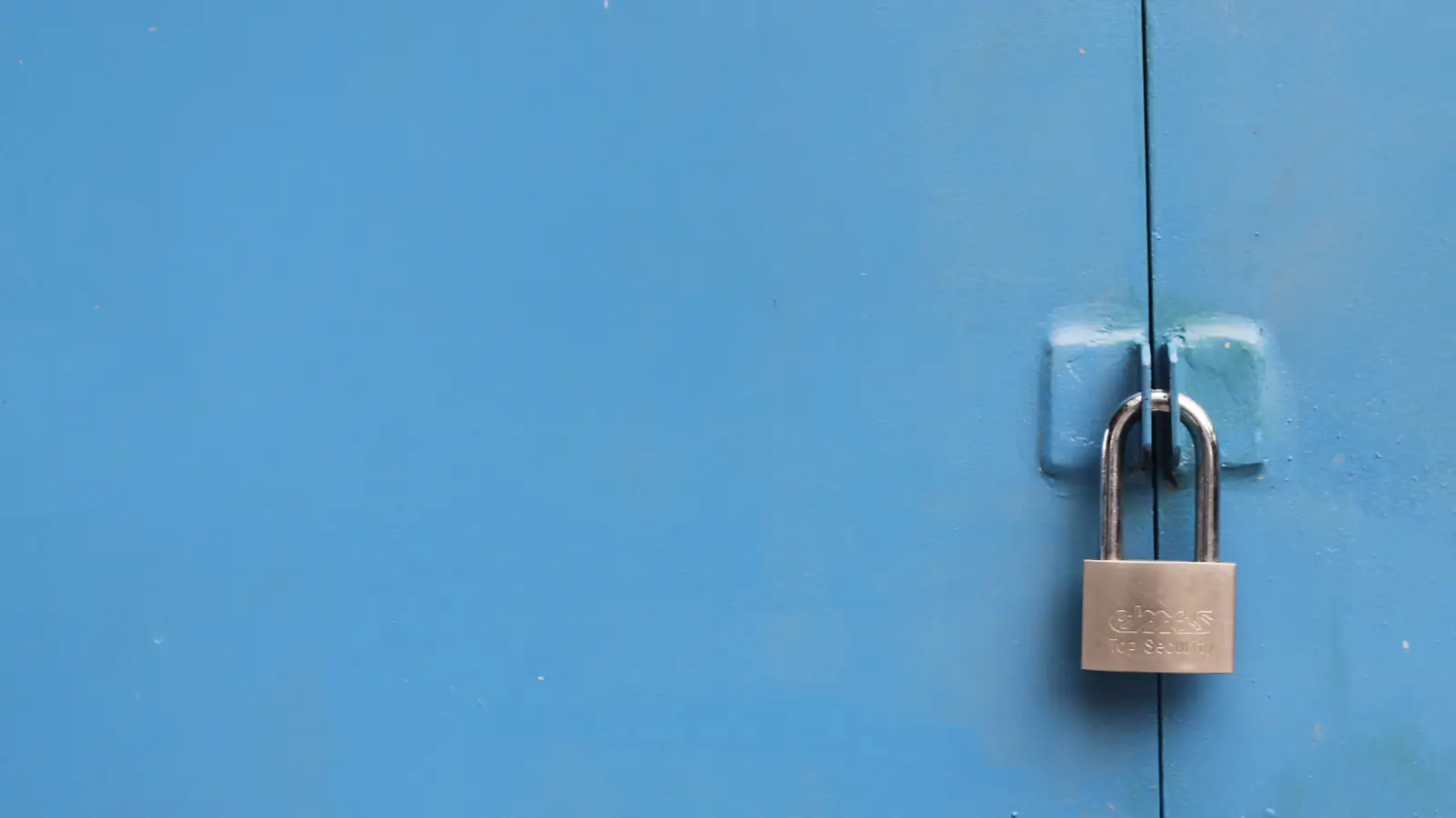 Close-up of a silver padlock, a symbol of the privacy questions around central bank digital currencies
