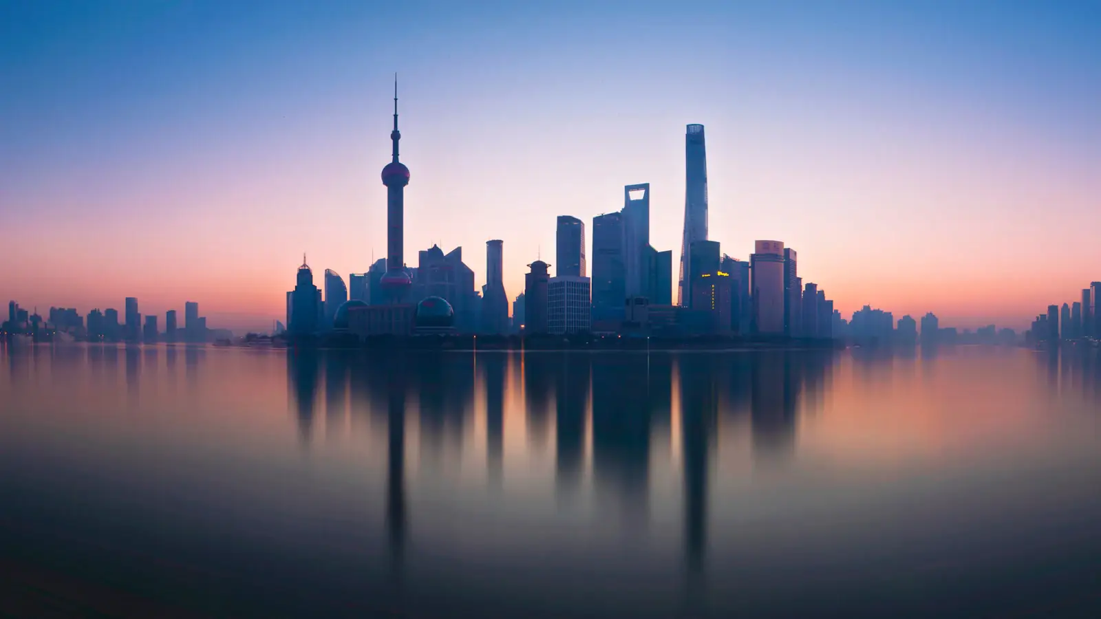 Lujiazui skyline reflected in the Huangpu River, Shanghai, China's financial hub