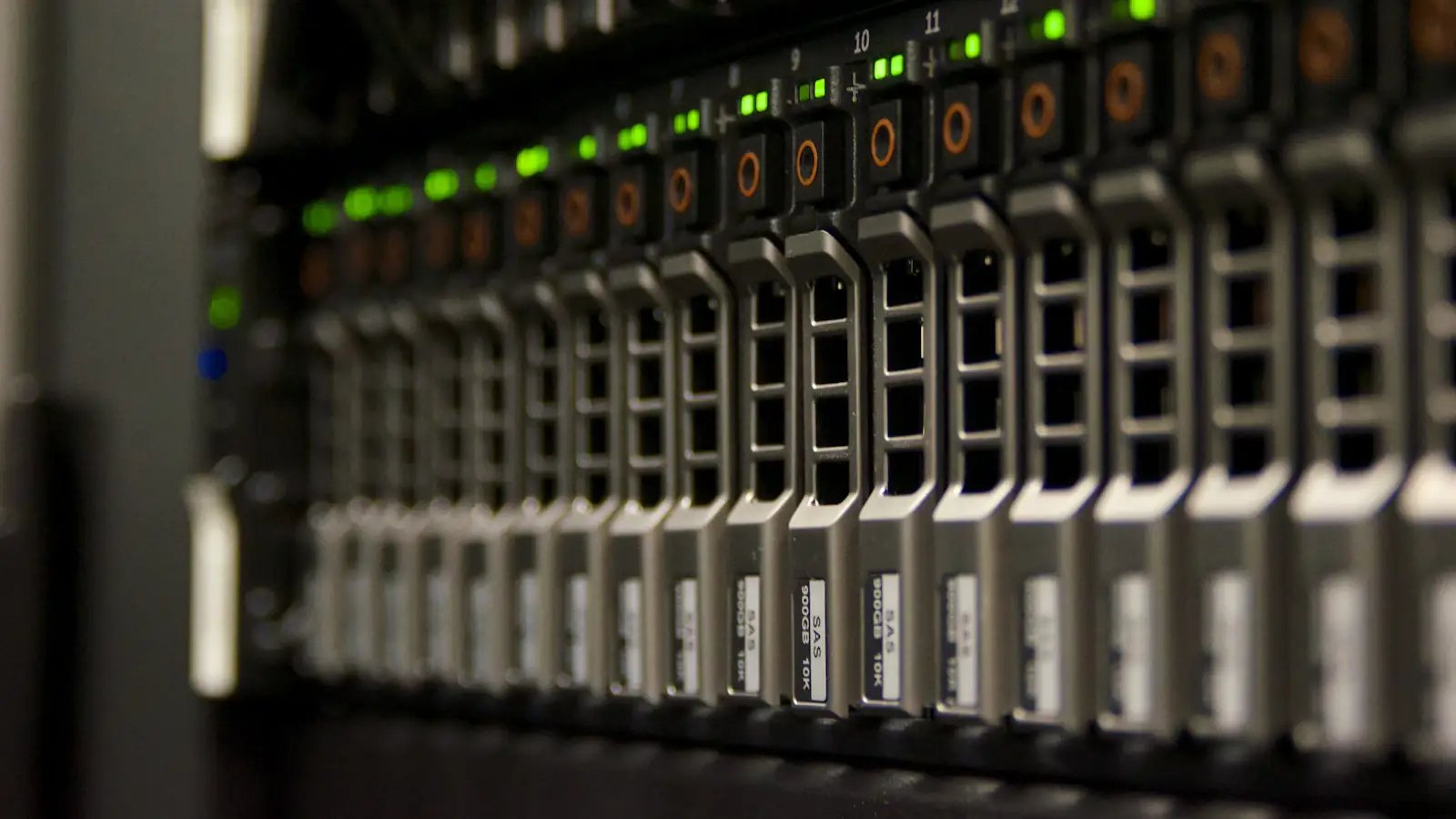 Server rack with blinking green lights, infrastructure powering the largest crypto companies
