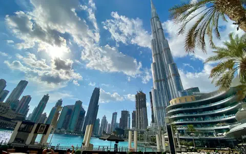 White high-rise towers beside the water in Dubai, a hub for UAE virtual asset regulators