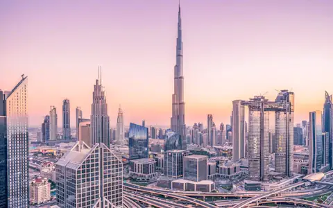 Downtown Dubai skyline in soft daylight, home to large Indian expatriate remittance senders