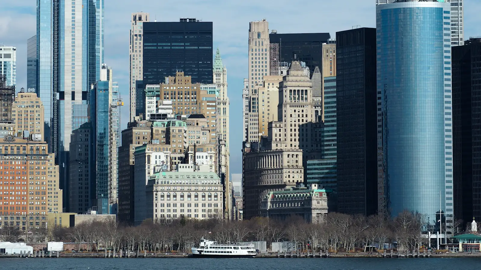 New York City towers rising over the water, heart of the leading US fintech companies